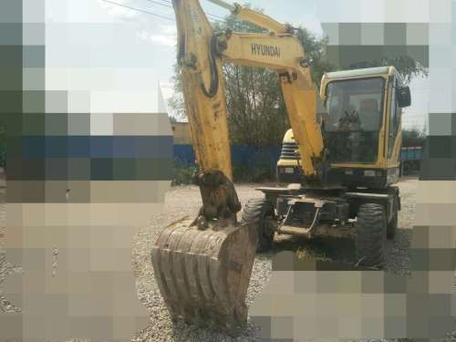 宁夏出售转让二手7800小时2011年现代轮挖R60W挖掘机