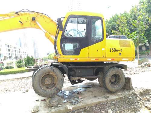 辽宁出售转让二手12000小时2003年现代轮挖R130W挖掘机