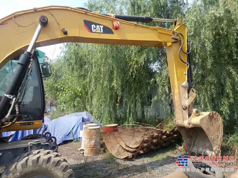 陕西出售转让二手2300小时2014年卡特彼勒轮挖M315D2挖掘机