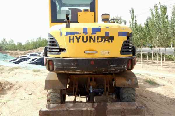 宁夏出售转让二手8000小时2009年现代轮挖R60W挖掘机