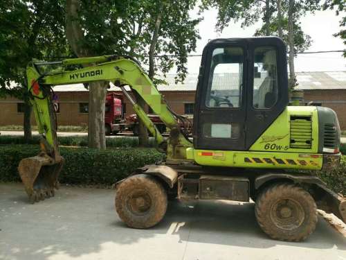 河南出售转让二手9860小时2007年现代轮挖R60W挖掘机