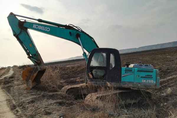 陕西出售转让二手7000小时2010年神钢SK210挖掘机