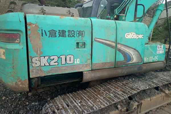 贵州出售转让二手9000小时2010年神钢SK210挖掘机