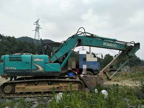 贵州出售转让二手7000小时2013年神钢SK140LC挖掘机