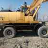 内蒙古出售转让二手9000小时2003年现代轮挖R210W挖掘机