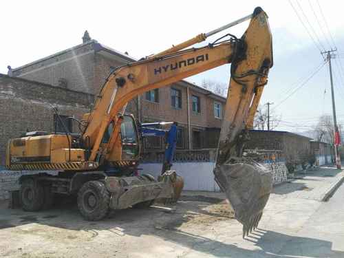 山西出售转让二手9000小时2007年现代轮挖R210W挖掘机