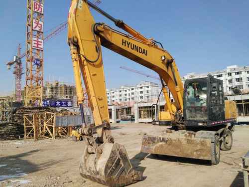 山西出售转让二手8500小时2009年现代轮挖R210W挖掘机