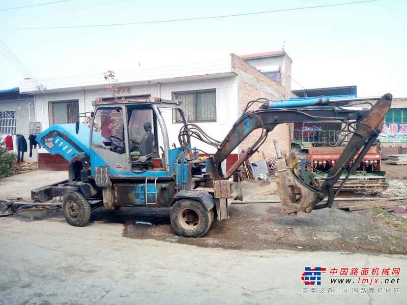陕西出售转让二手8000小时2010年欣安远轮挖AWL7038挖掘机