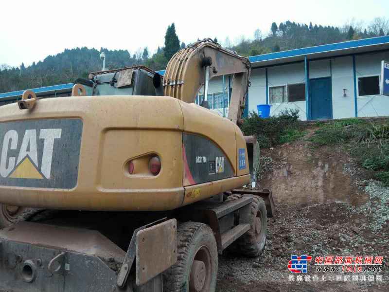 重庆出售转让二手800小时2014年卡特彼勒轮挖M317D2挖掘机