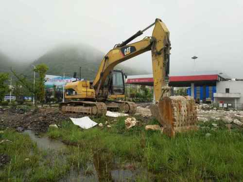 贵州出售转让二手6219小时2010年卡特彼勒323D挖掘机